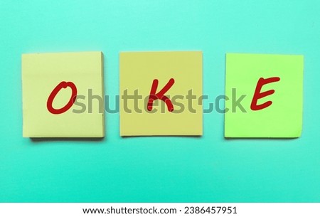 Okay writing on sticky note isolated on green background.Okay on empty Space sticky note theme