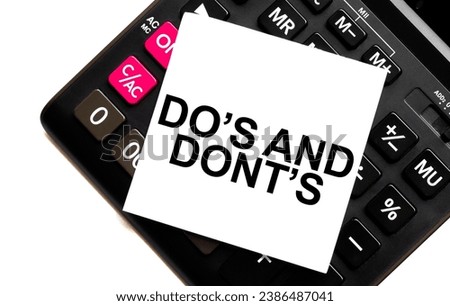 DO's and DONT's on white sticker and calculator on white background
