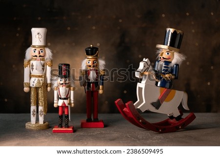 Christmas  nutcrackers on dark background with bokeh