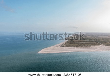 Aerial landscape panorama of Skagen Odde peninsula and Grenen - a meeting point of North and Baltic Sea. North Jutland, Nordjylland, Denmark