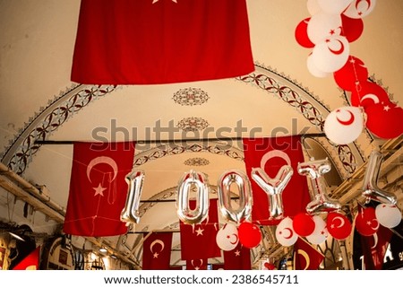Turkish flags proudly adorn the inside roof, celebrating the centennial of the Republic. Limited edition captures this historic display, embodying patriotic spirit in Istanbul.