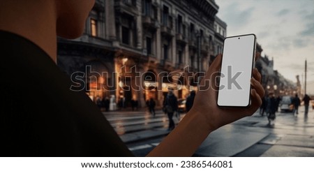 CU Caucasian male using his phone in the street, evening, blank screen social media, taxi, ride sharing smartphone application mockup