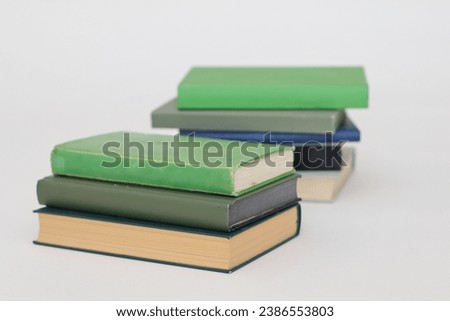 Green books on white background education school