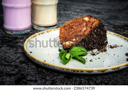 Close-Up of Chocolate Cake Slice on Plate. Ideal for dessert, bakery, or celebration-themed projects, this high-resolution image captures the delicious details and culinary artistry. Selective focus