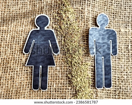 Concept of separating, death, divorce family or couple of man and woman with drugs and bad thing. Bad addiction to drugs. Paper black figurines of man and woman and one partner is covered with seeds