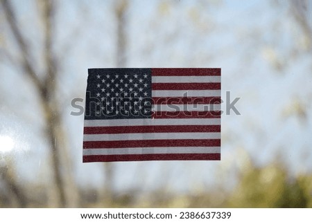 American flag on a window
