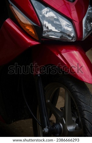 The front of the motorbike is red