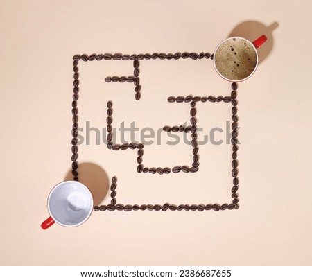 conceptual photo. on a beige background, a maze game made from coffee beans.