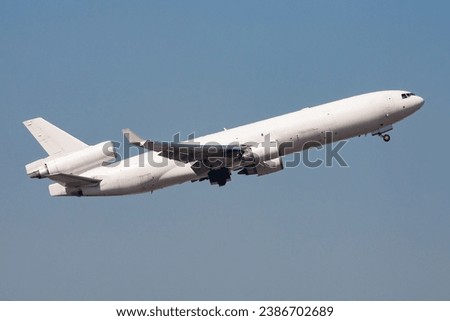 Untitled cargo plane at airport. Aviation industry and aircraft. Air transport and flight travel. International transportation. Fly and flying. Creative photography. Commercial theme.