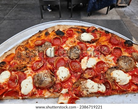 Famous Pizza place in the Italian district of san Francisco California referred to as Tony's Pizza Royalty-Free Stock Photo #2386719221