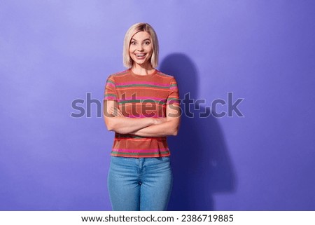 Photo portrait of nice beautiful young funny girl blonde model surprised crossed hands confident isolated on violet color background