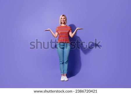 Full size body photo of young friendly promoter girl hold two palms comparing two market leaders isolated on purple color background