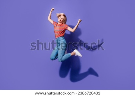 Full size body photo of young student jumping she approved to university the most intelligent teenager isolated on violet color background