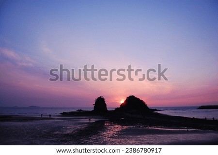a picture of sunset by the sea