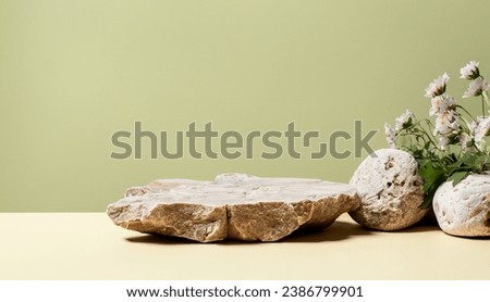Composition empty podium material multiple stone with minimalist flowers. Product presentation. Background beige green. Beautiful background from natural materials Royalty-Free Stock Photo #2386799901
