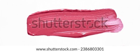 Pink Lipstick smear smudge swatch isolated on white background. cosmetic product brush stroke swipe  on the wall