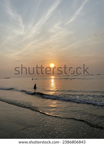 A picture of sunset on the beach