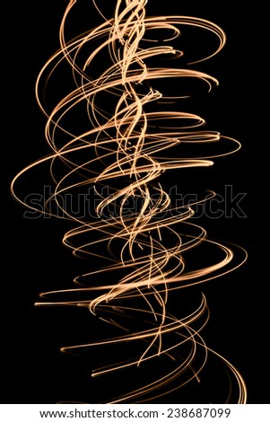 Abstract glowing swirl on black background