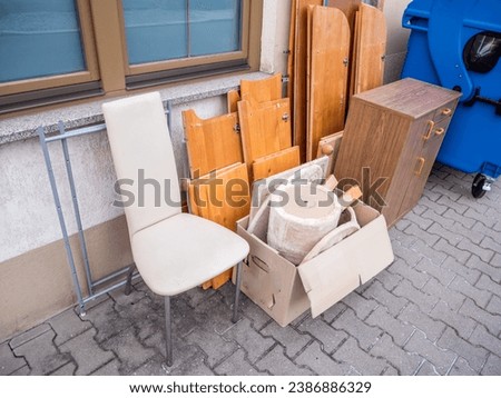 bulky waste on the street Royalty-Free Stock Photo #2386886329