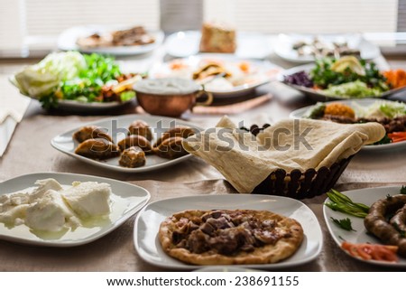 Traditional foods like mumbar, buryan, kebab, baklava from Turkish cuisine Royalty-Free Stock Photo #238691155