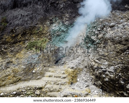 a limestone plateau that emits a natural sulfur smell and smoke in the Gedung Songo Temple area, Indonesia.