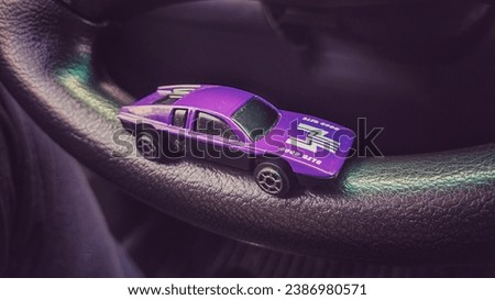 Sport Car. vintage racing car. toy purple car. blue toy car.