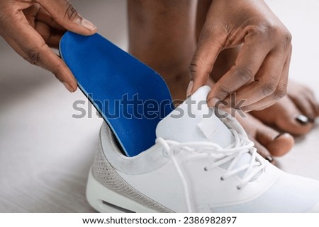Orthopedic shoes with arch support for happy feet Royalty-Free Stock Photo #2386982897