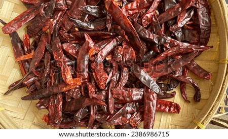 Dried red chilies in a container