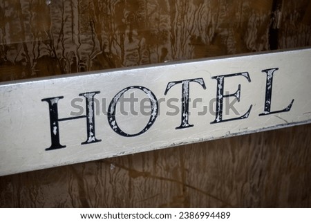 Closeup of Hotel signage in the street