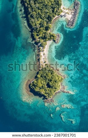 Aerial coral necklace around island Martinique Royalty-Free Stock Photo #2387001701