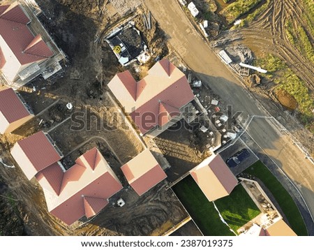 Drone top down view of private and affordable housing in development in East Anglia, UK.