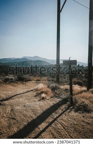 Trail sign at telephone pole in Granite Mountains in Prescott Arizona