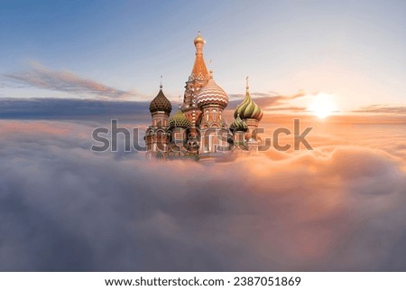 Historical Saint Basil's Cathedral Red Square Moscow, Russia in clouds with golden hours, sun, sunrise, sunset. The Kremlin heart, The Russian Empire icon. Square Golden City.
