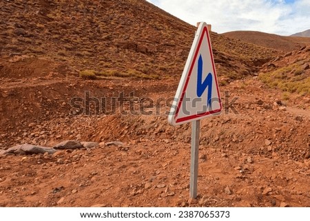 Double Bend Traffic Road Sign in The Desert