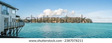 A Panoramic view of Manukau Harbour from Blockhouse Bay Beach in Auckland New Zealand on Sunny Afternoon Royalty-Free Stock Photo #2387078211