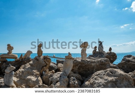 Stone pyramids set on a coastal rock in Rhodes