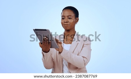 Business, research or black woman in studio with tablet for email planning on blue background. Internet, scroll or female African entrepreneur with technology for online review, news or feedback