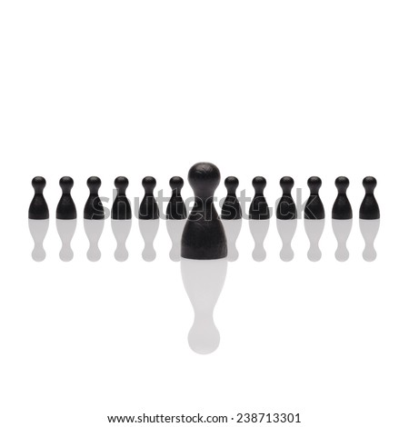 Business concept for leader team, leadership, step forward.Line of small black pawn figures one in front, square image isolated on white background. Copy space, room for text.