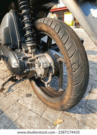patching motorbike tires - stock photo