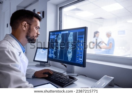 MRI diagnostic center control room and neurologist examining patient X-ray images on large display.