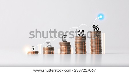 Inflation concept, graph arrow, Percentage sign on wooden cube with rows of coins in idea for FED considers interest rate hike, world economics and inflation control, Inflation interest rates rise