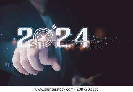 Businessman analyzes business growth plan in 2024, digital marketing strategy, revenue, profit, economy, stock market and business trends. Technical Analysis Strategies Using Future AI Technology Royalty-Free Stock Photo #2387230351