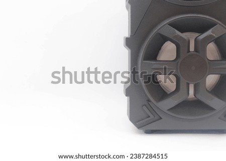 Small size black speaker on white background
