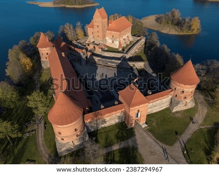 Top down drone picture of Trakai castle interior surrounded by lake Galve (Galvė) located in Trakai, Lithuania