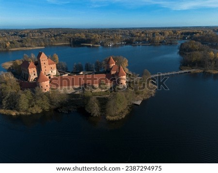 Drone picture of Trakai castle from the side surrounded by lake Galve (Galvė) located in Trakai, Lithuania