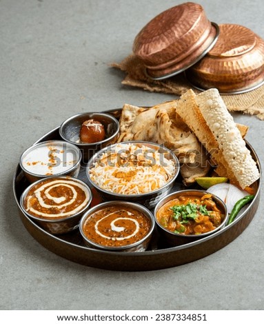 Indian platter thali - Indian food set. Royalty-Free Stock Photo #2387334851