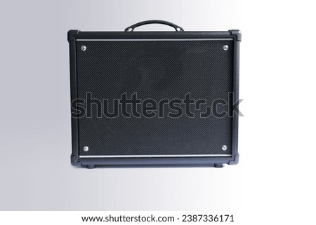 Electric guitar amplifier white background Royalty-Free Stock Photo #2387336171