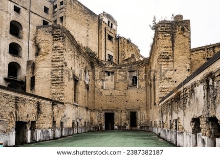 Inside and Facade of the eighteenth-century Real Albergo dei Poveri from the Real Orto Botanico, Naples, Italy Royalty-Free Stock Photo #2387382187