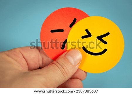 Angry and happy face, human emotions, hand painted facial expressions, positive attitude and angry facial expression, Emotion change, blue background