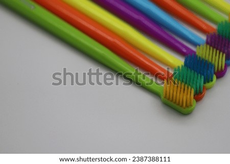 A set of colorful toothbrushes for children